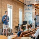 Small business team planning a LinkedIn content strategy around a whiteboard