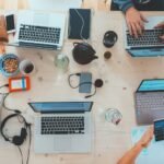 Choosing a Domain Name for Your Small Business NZ 3 Person typing on a laptop while researching a domain name for their small business