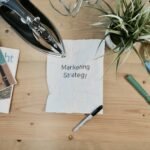 Marketing strategy flatlay representing planning a Pinterest marketing approach for a small business