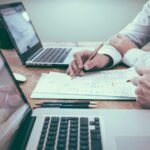Website Legal Requirements for Auckland Businesses in 2026 2 Team reviewing website compliance documents and laptops before publishing a business website in Auckland