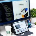 Website navigation menu bar visible on a designer's desktop screen while planning a small business site structure