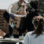 Volunteers loading donated food boxes, representing the trust a charity website needs to earn before someone gives online