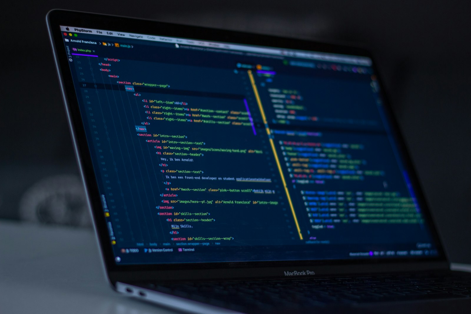 Close-up of code on a laptop screen, illustrating schema markup for small business websites in NZ